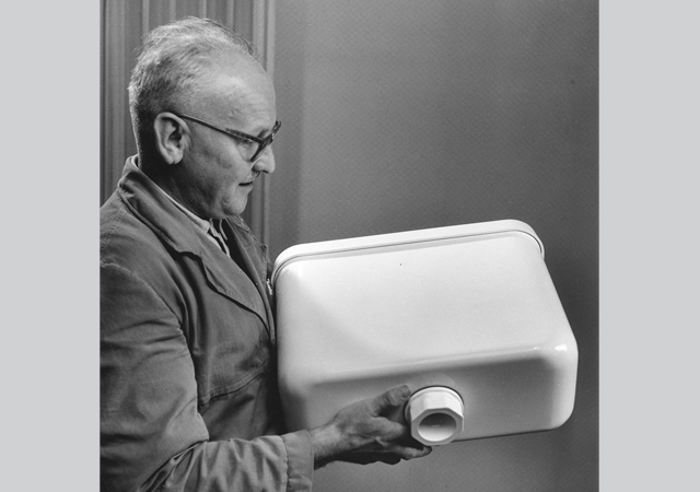 A technical advisor with an early plastic cistern.